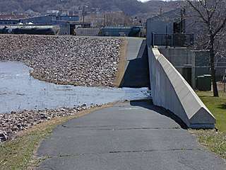 behind North Star (Hanson) Concrete, water overcomes the trail in a low spot 4/17/01